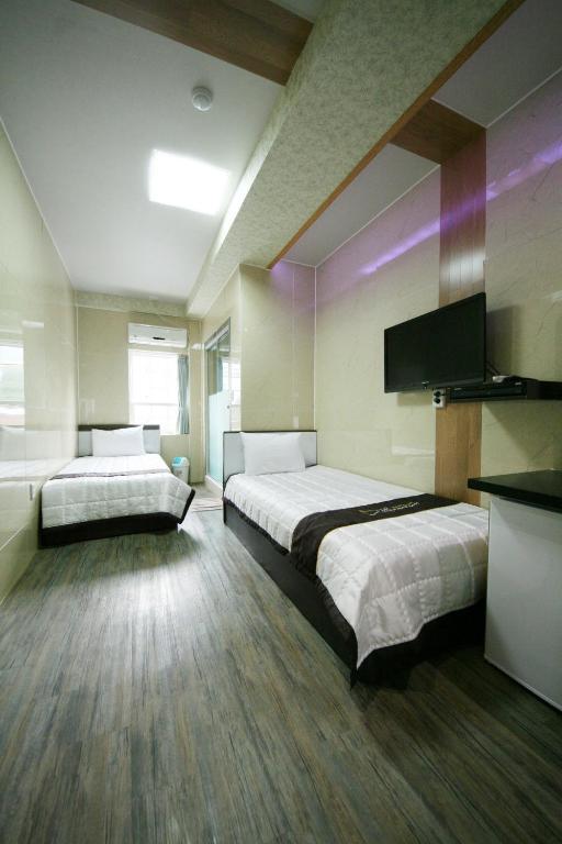 Guesthouse Myeongdong 2 Сеул Стая снимка