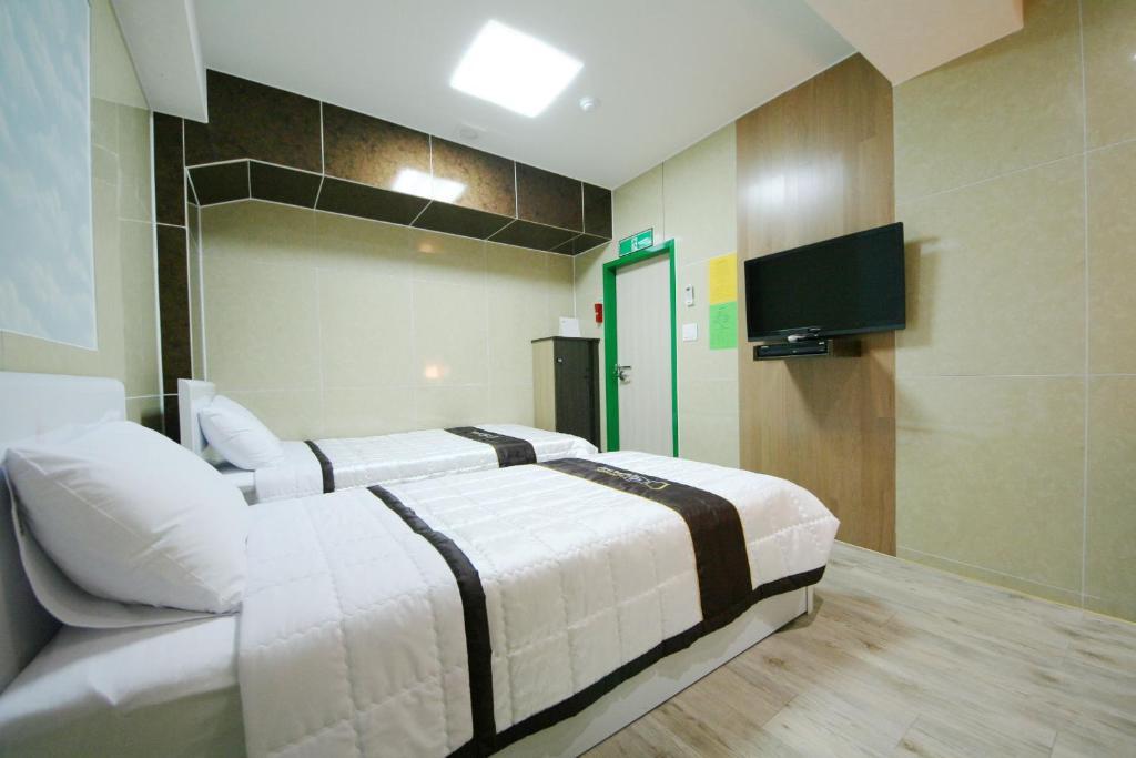 Guesthouse Myeongdong 2 Сеул Стая снимка